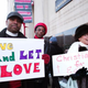 Supporters of same-sex marriage in front of the federal courthouse in Detroit March 3, 2014
Bill Pugliano/Getty Images